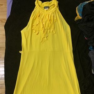 Bright yellow dress with chest ruffles